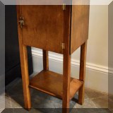 F47. Small wood cabinet with door. 28”h x 15”w x 10”d - $60 
